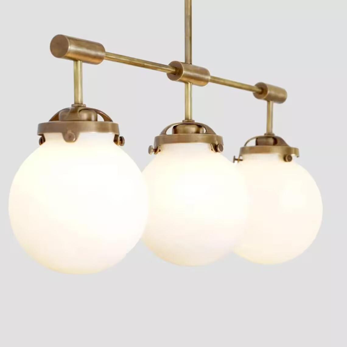 Hanging light Mid Century Style 3 Glass Globe Brass fixture Raw Brass Finish Bedroom